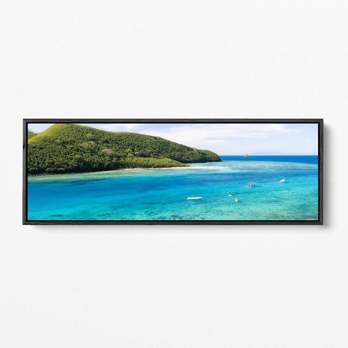 Manta Ray Island above its turquoise lagoon in Fiji panoramic black framed canvas