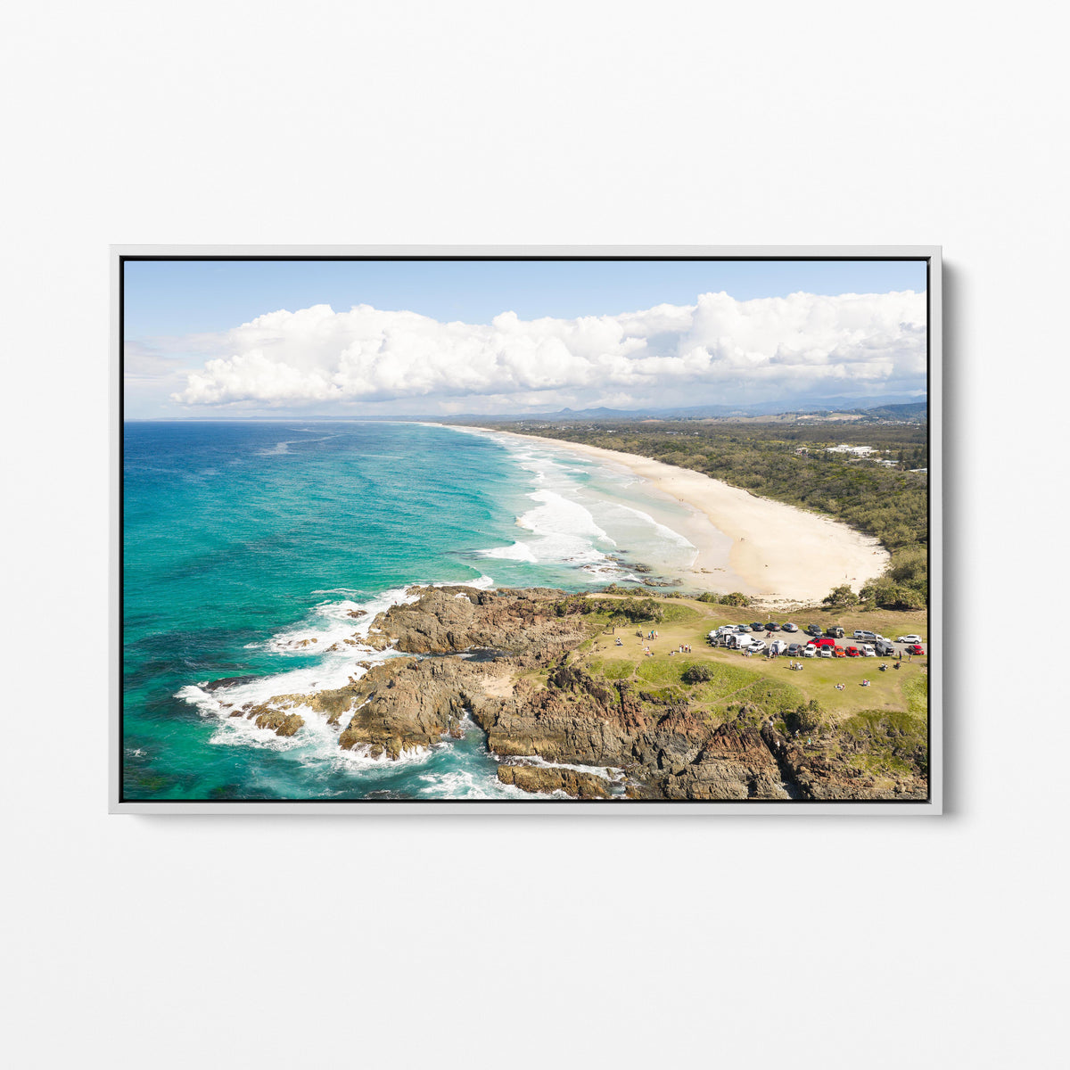 Aerial photograph of the green headland above the rocks at Hastings Point NSW in a white frame