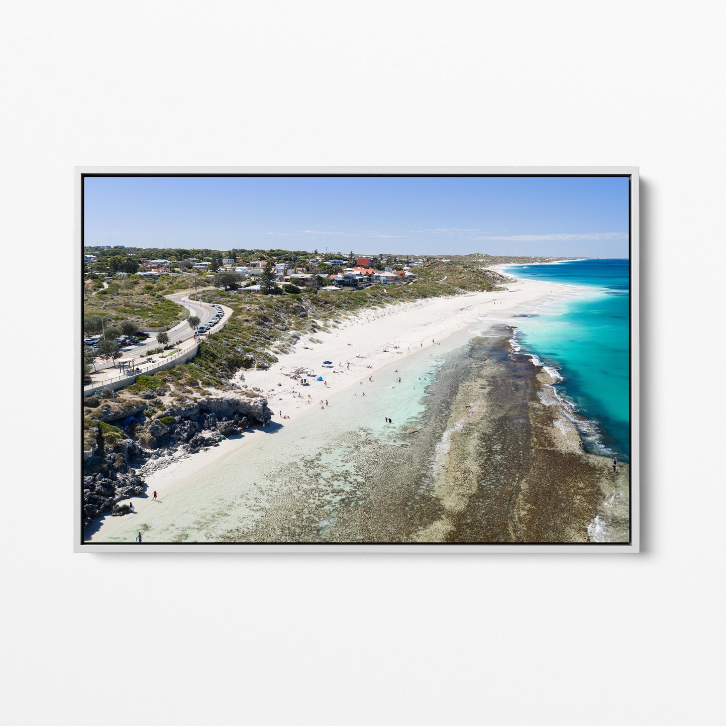 Yanchep Lagoon with the town above the beach, in a white frame