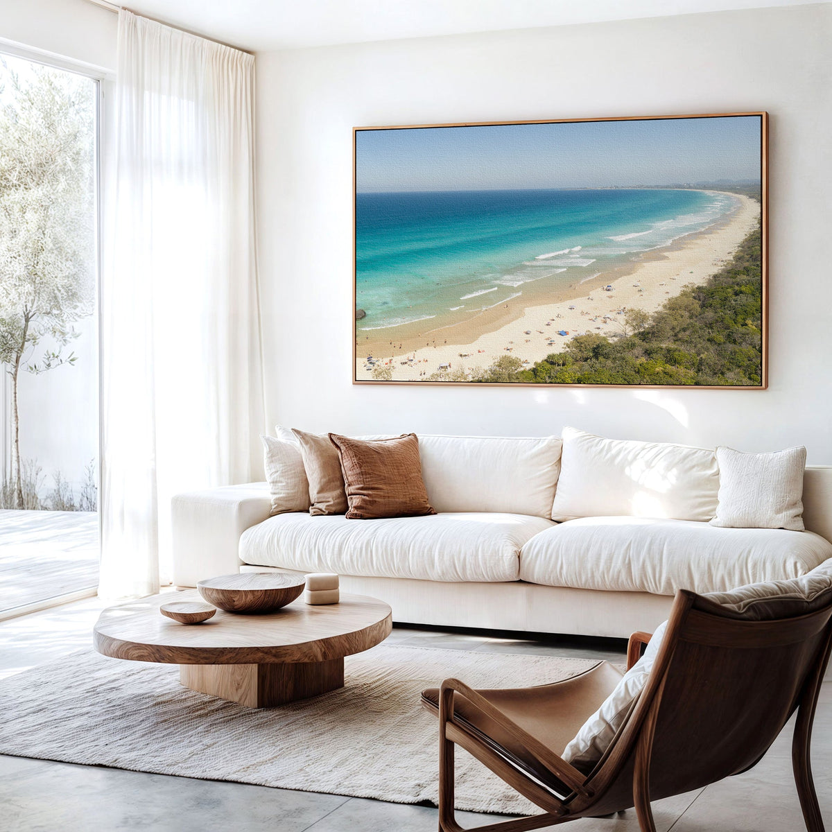 Aerial photography of Dreamtime Beach canvas wall art hanging above a sofa in a living room