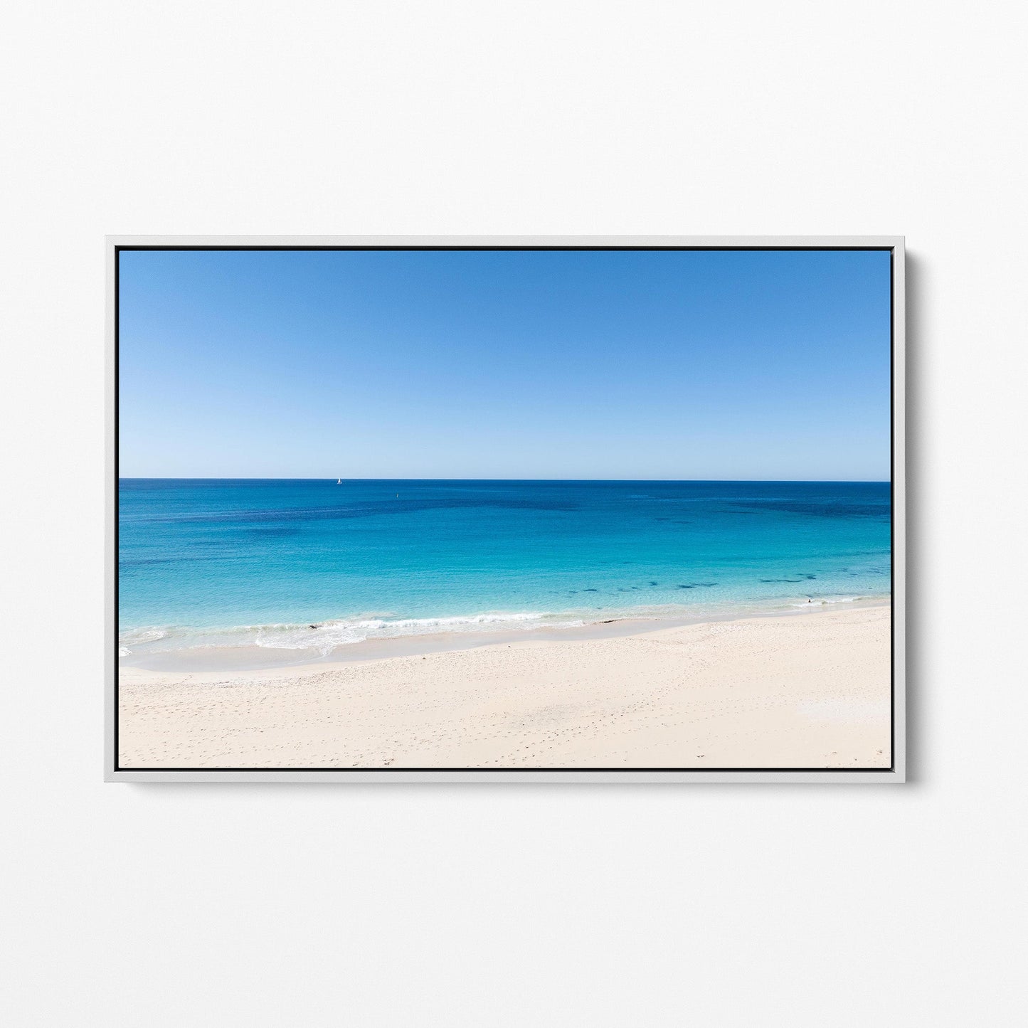 Eagle Bay sea and sand white framed canvas