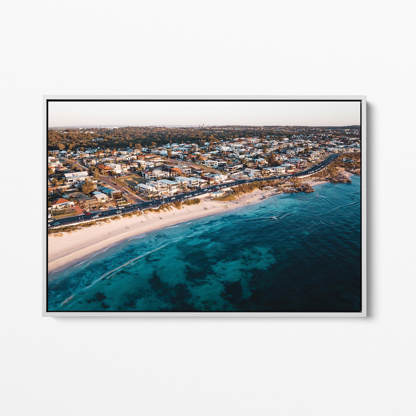 Trigg coastal sunset white framed canvas