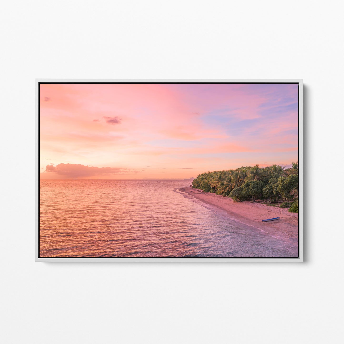Serenity Island at sunset in Fiji in a white frame