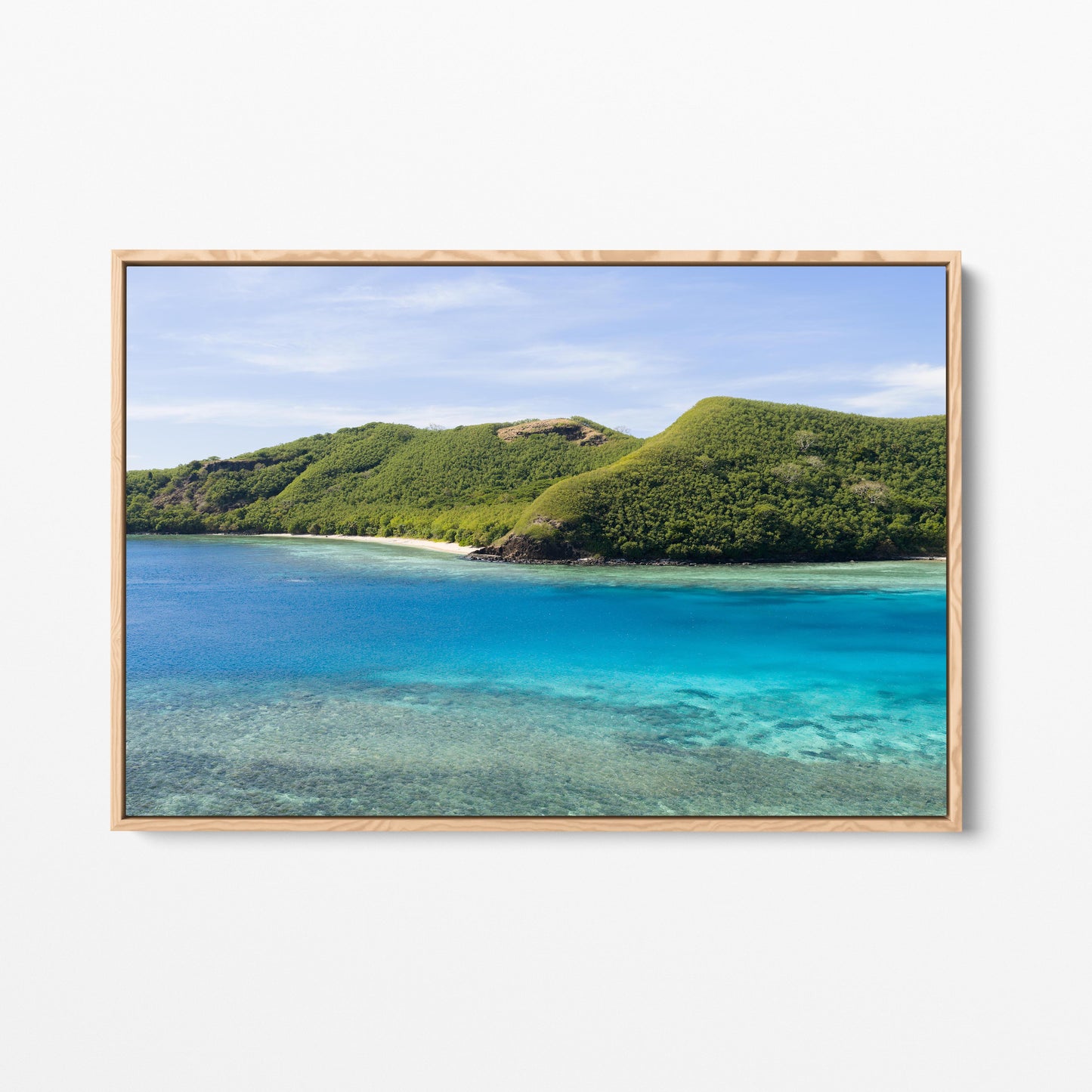 Manta Ray Island ridge and cove beach in Fiji in an oak frame