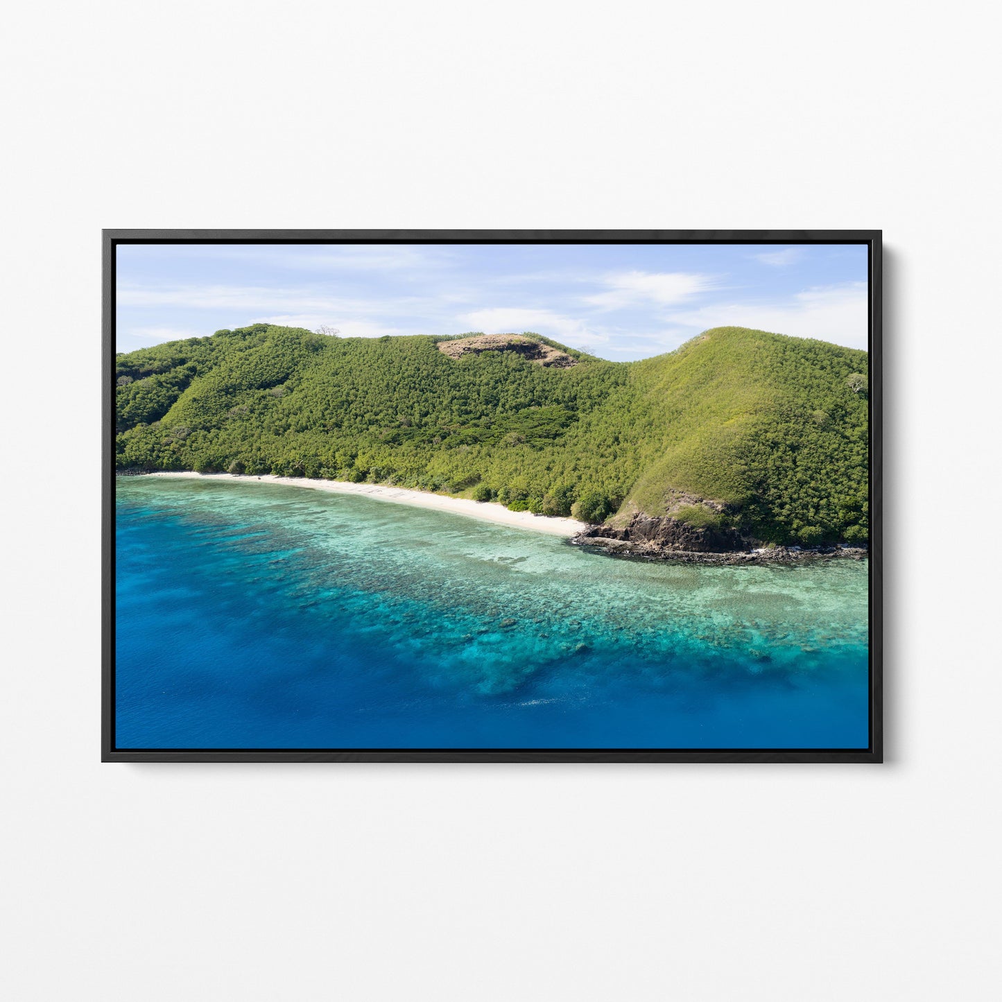 The rocky point at Manta Ray Island in Fiji in a black frame