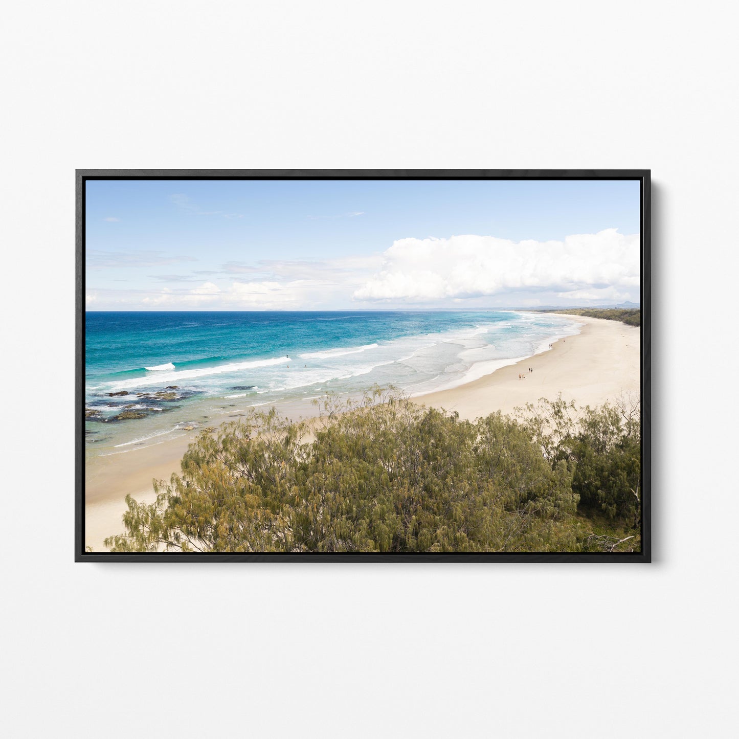 Aerial photograph of the Hastings Point coastline NSW past the dune scrub in a black frame