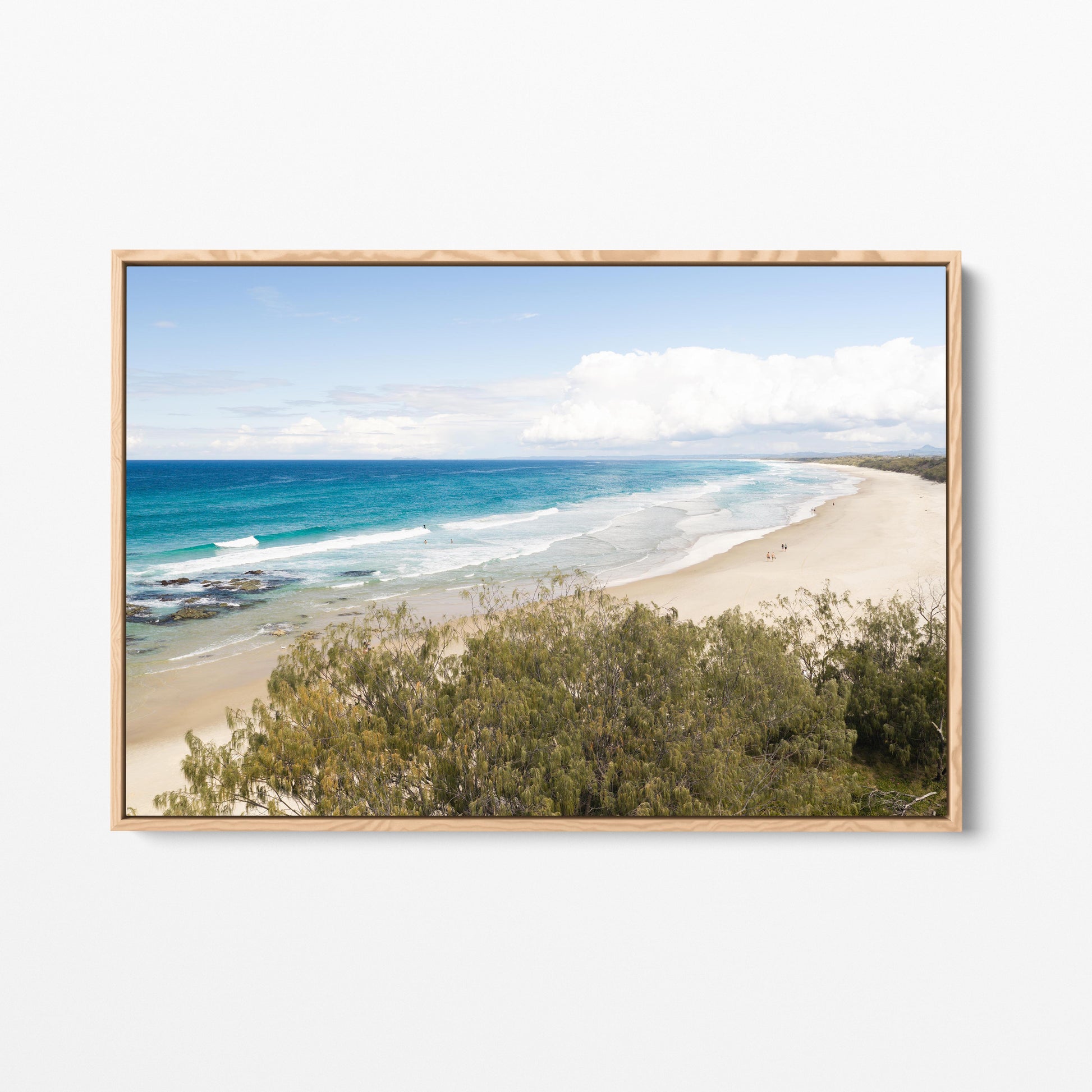Aerial photograph of the Hastings Point coastline NSW past the dune scrub in an oak frame