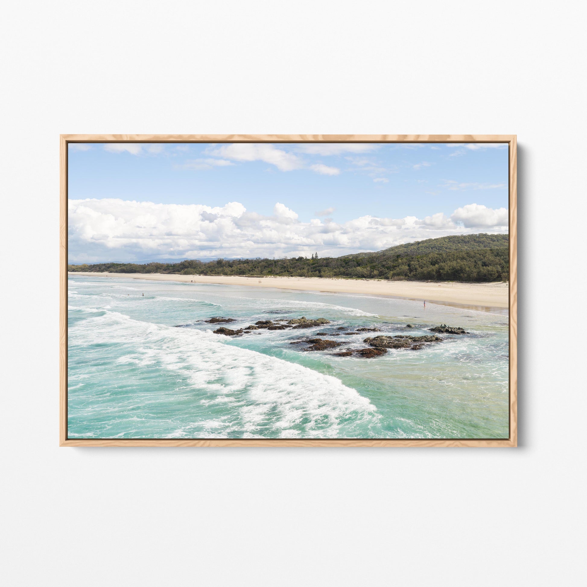 Aerial photograph of the reef shelf and beach at Hastings Point NSW in an oak frame