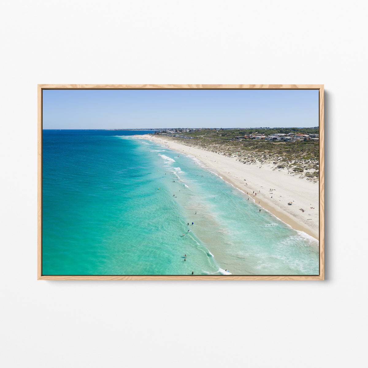 Oak framed canvas print of aerial photography of Trigg Beach, a long curving beach with turquoise water, white sand and coastal bush