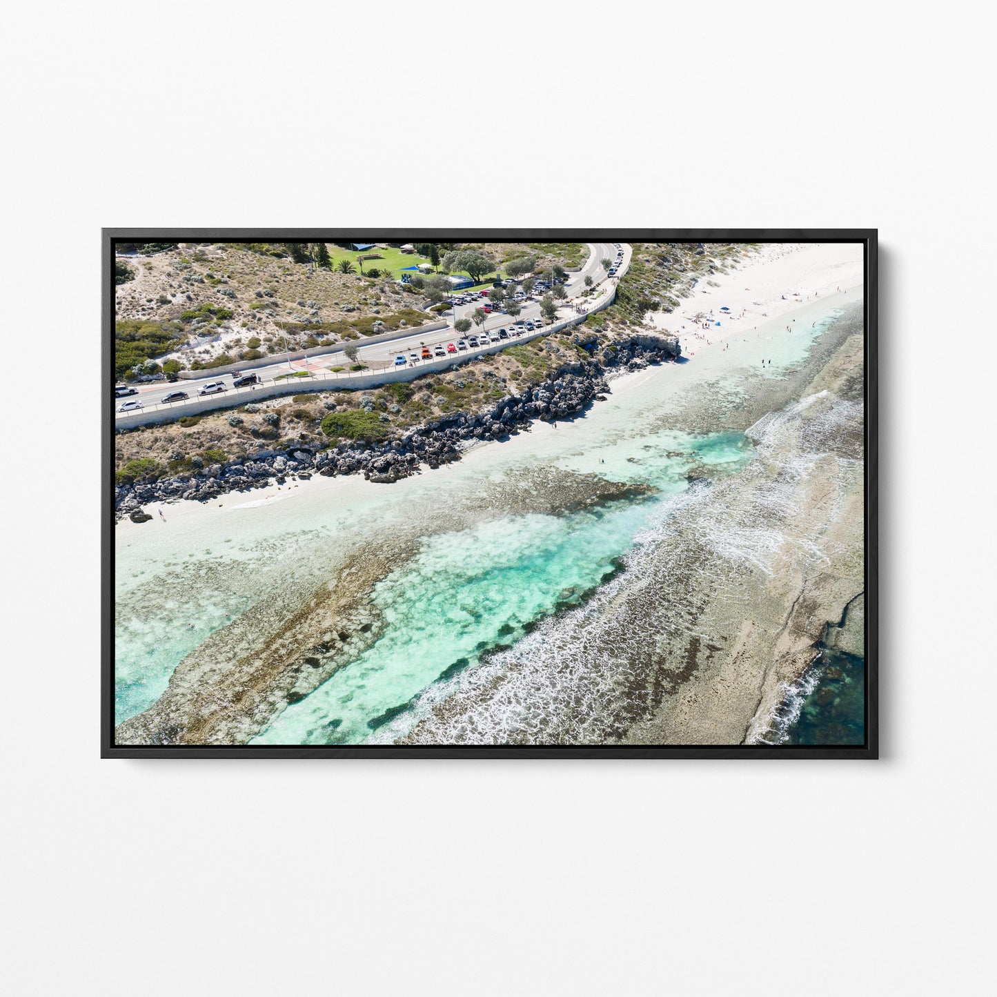 The coast road and reef at Yanchep Lagoon, in a black frame