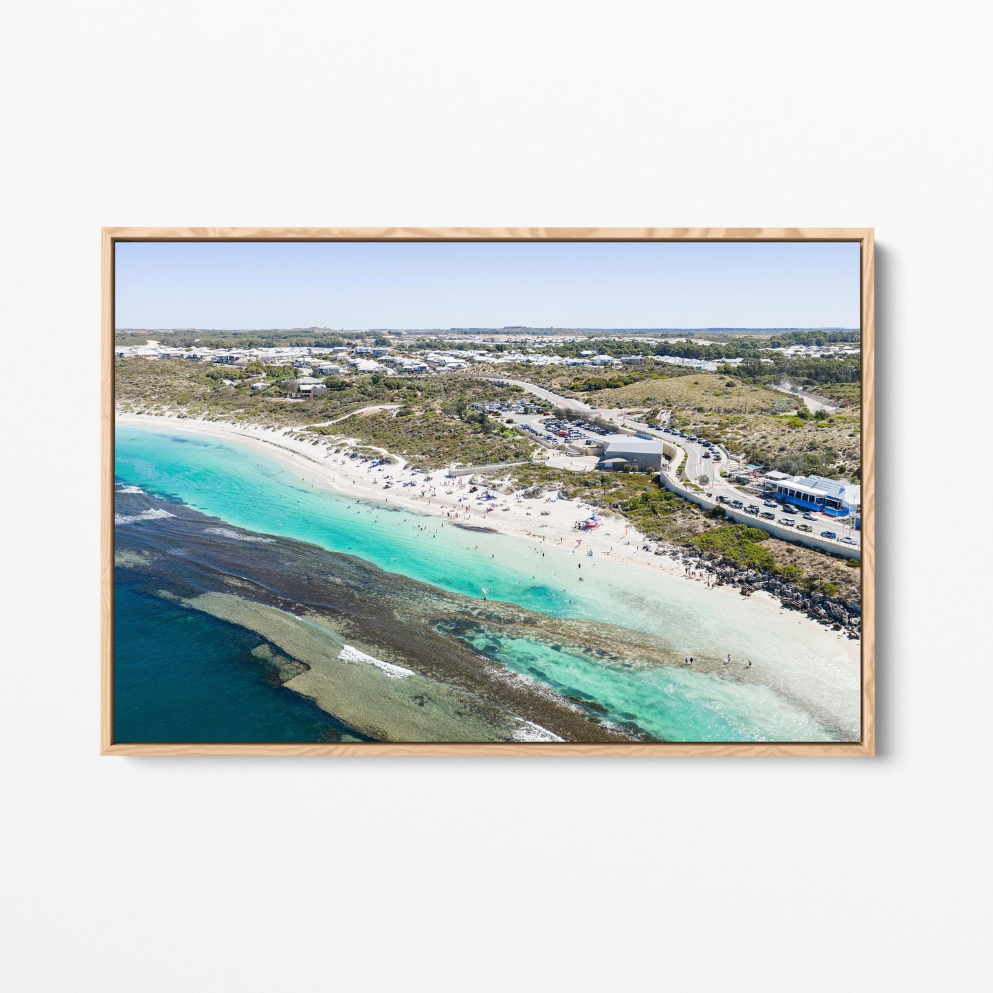Yanchep Lagoon beach and the suburb behind it, in an oak frame