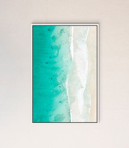 Ocean waves print hanging in a home