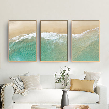 Bondi Beach birdseye three piece canvas wall art II in living room