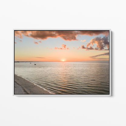 White framed canvas print of the sun setting over Geographe Bay at Busselton, Western Australia