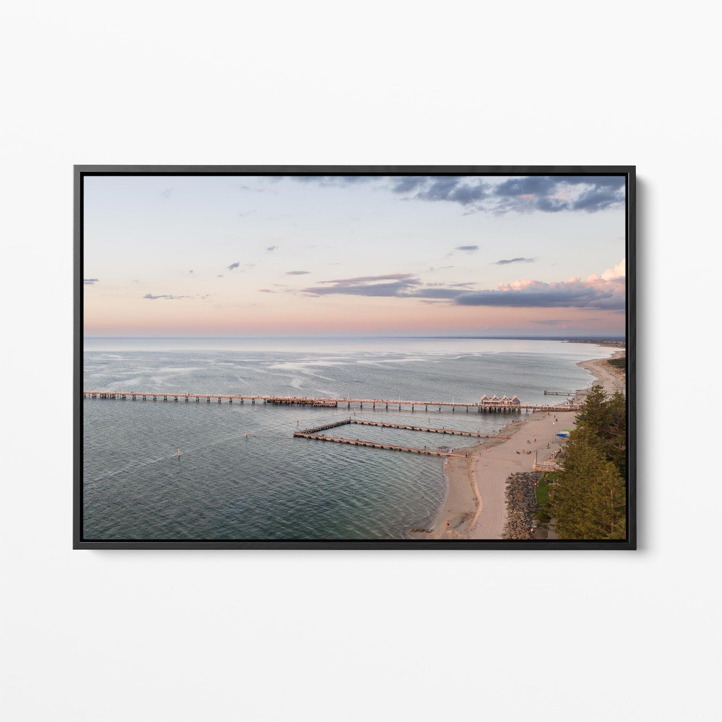 Black framed canvas print of Busselton Jetty across Geographe Bay at sunset, Western Australia