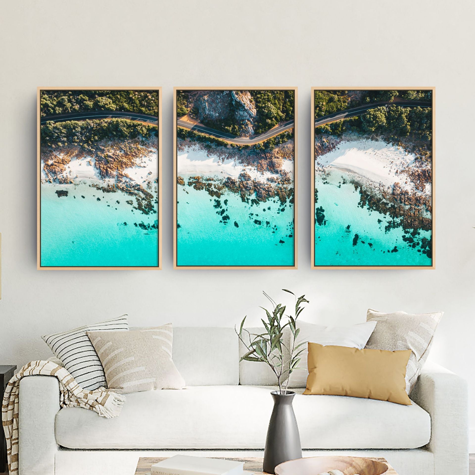 Three piece canvas wall art in a living room setting