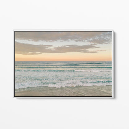 White framed canvas print of surfers in the lineup at Duranbah Beach at sunset, New South Wales