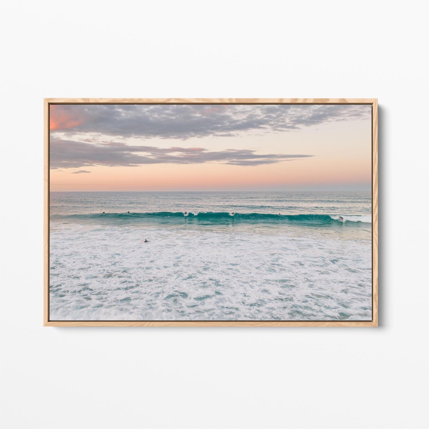 Oak framed canvas print of a lone surfer at Duranbah Beach at sunset, New South Wales