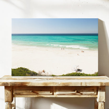 Stretched canvas print of aerial photography of Fingal Head, white sand and turquoise water with a small structure and bush at the bottom on a console table