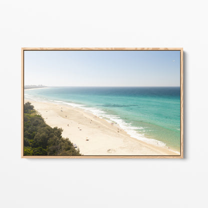 Oak framed canvas print of aerial photography of Fingal Head, a pale sand beach with coastal bush in the bottom left and turquoise water