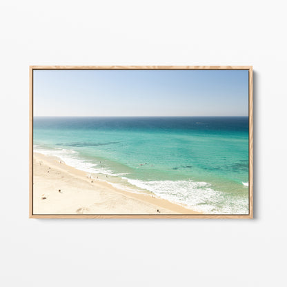 Oak framed canvas print of aerial photography of Fingal Head, a long strip of sand with turquoise surf rolling onto the shore