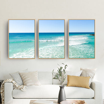 Palm Beach Surfers three piece canvas wall art in living room