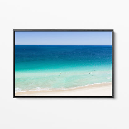 Black framed canvas print of aerial photography of Scarborough Beach, dark blue ocean, a turquoise band of shallows and pale sand