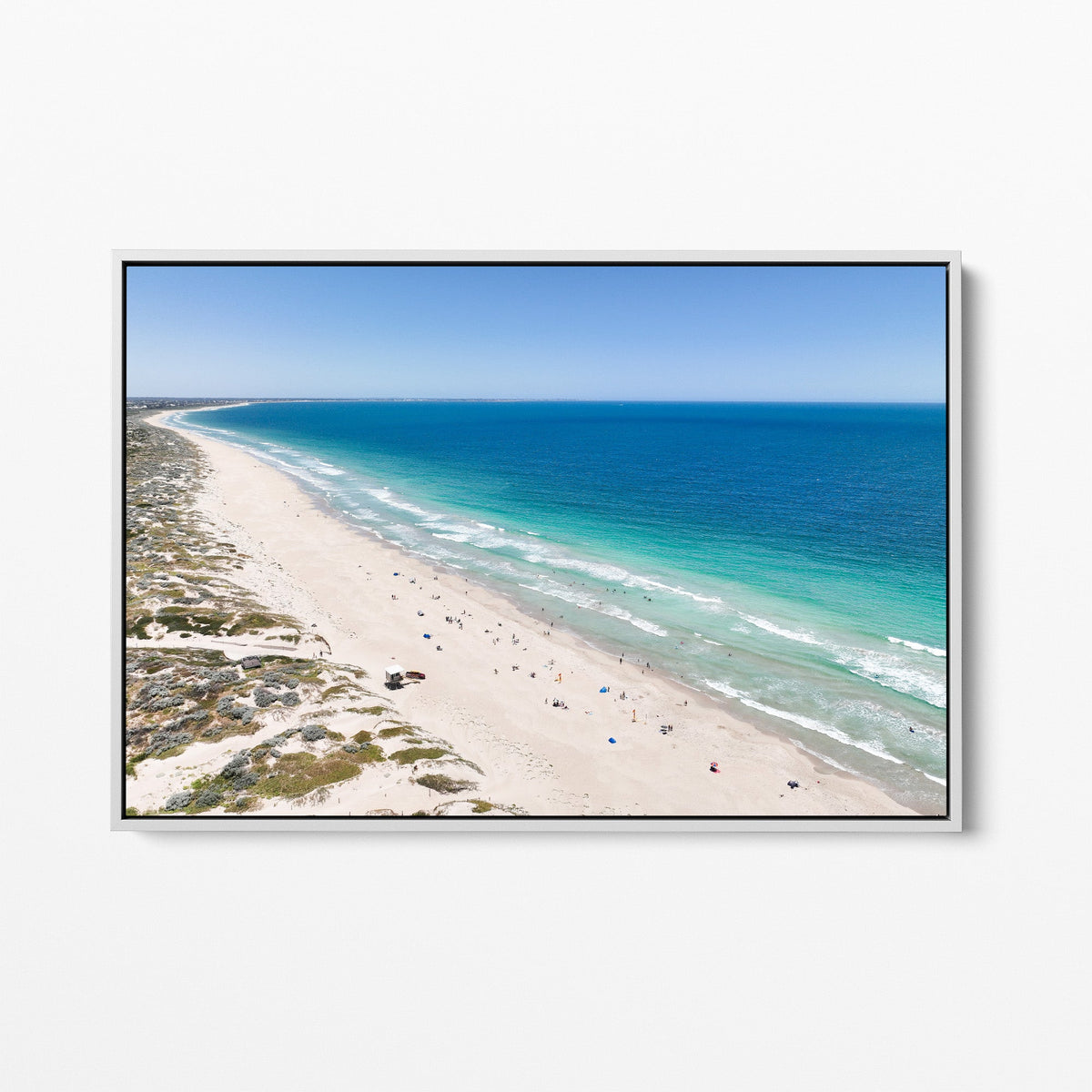 Secret Harbour coastline white framed canvas