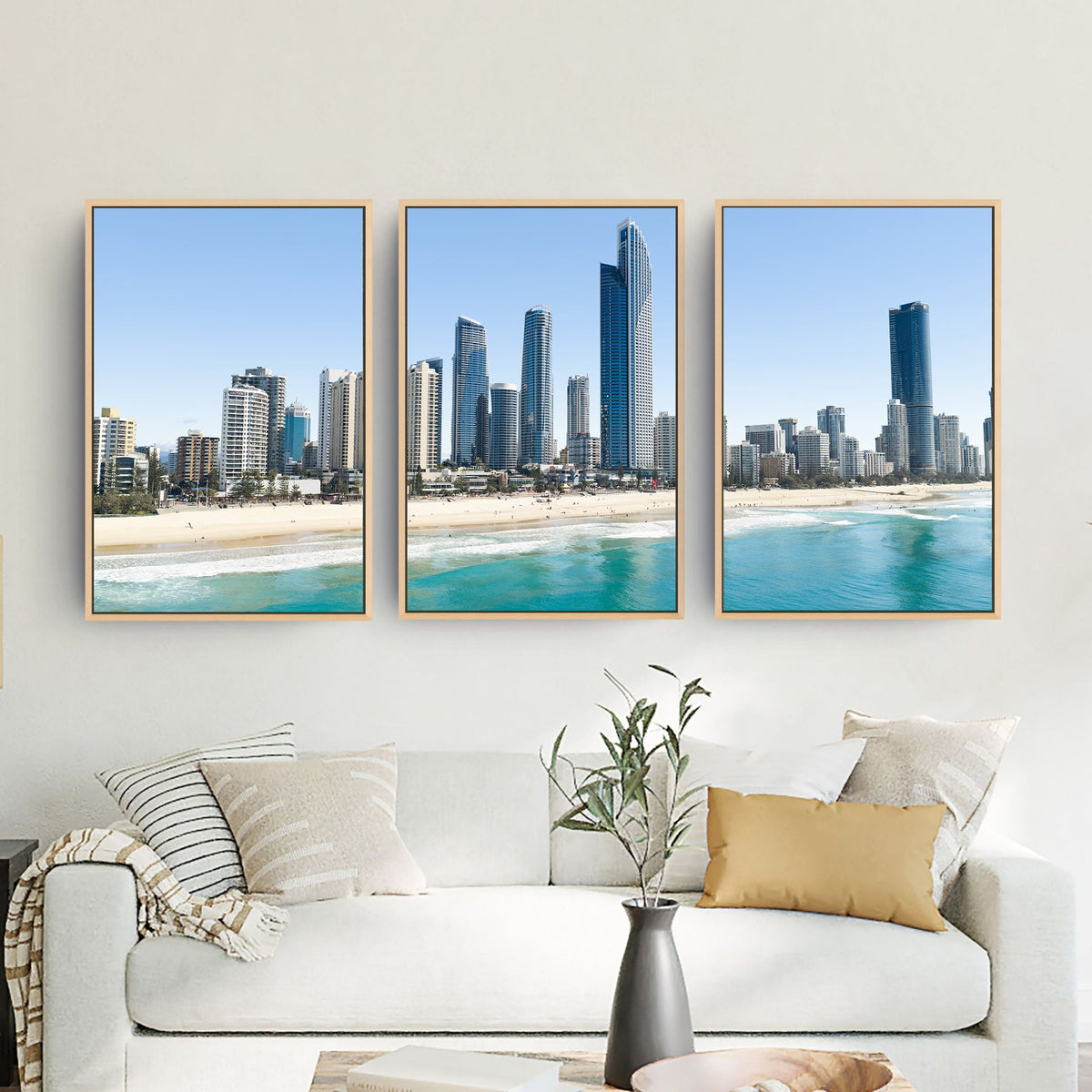 Surfers Paradise three piece canvas wall art in living room