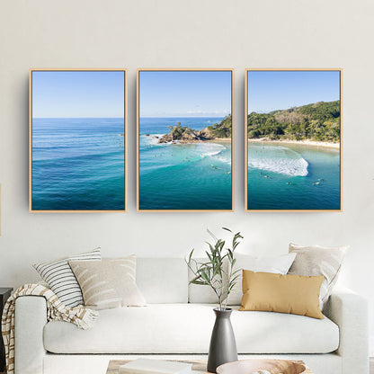 Wategos Beach three piece canvas wall art in living room