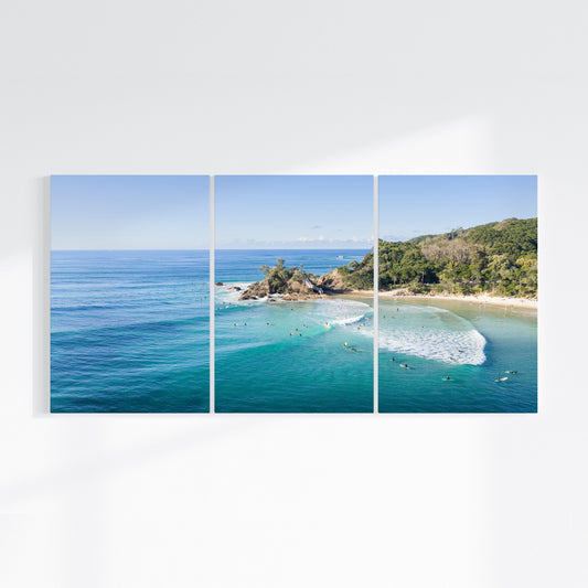 Wategos Beach three piece canvas wall art on wall
